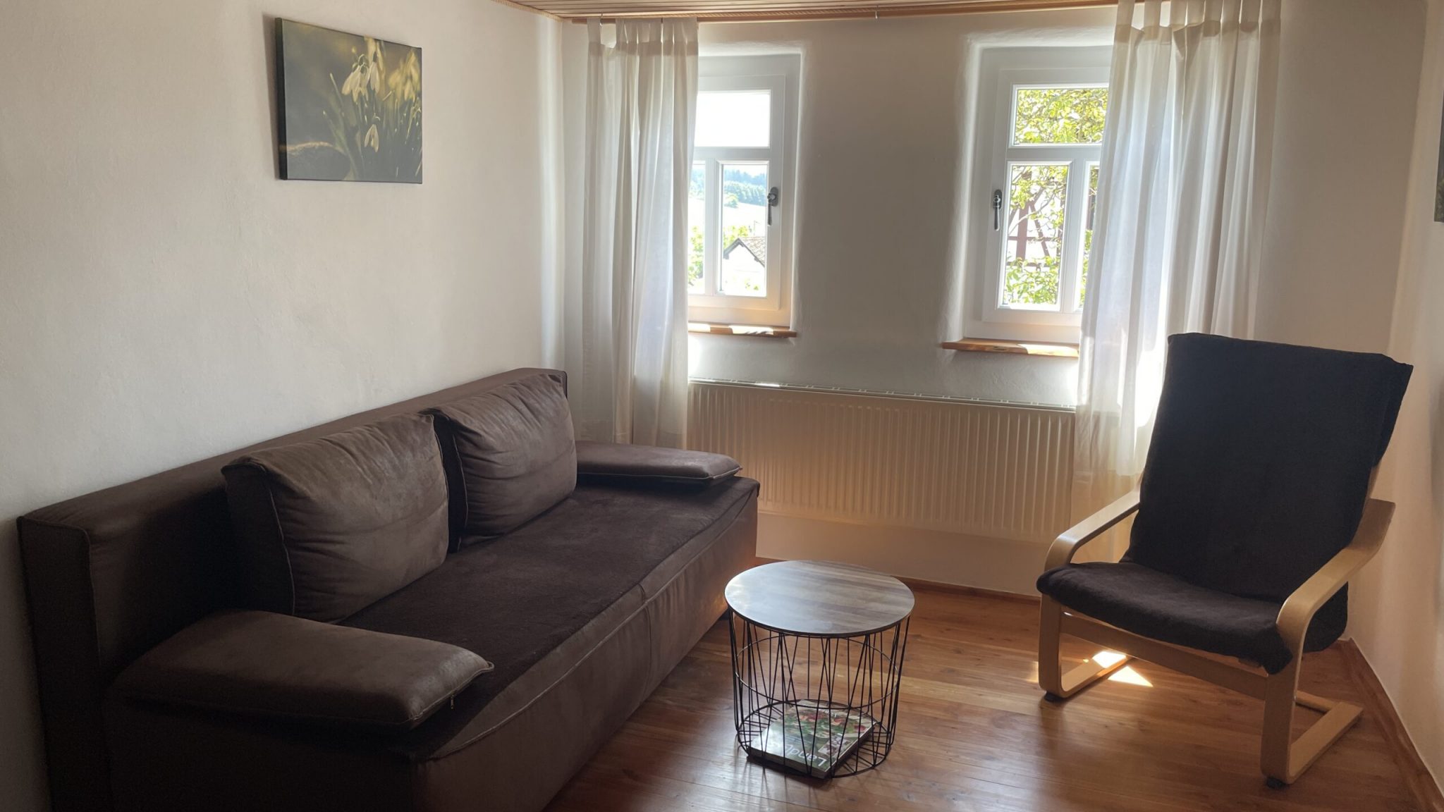 Sitzgruppe im 1. OG - kann als Schlafcouch umfunktioniert werden